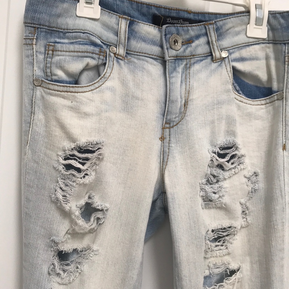 Distressed light wash jeans